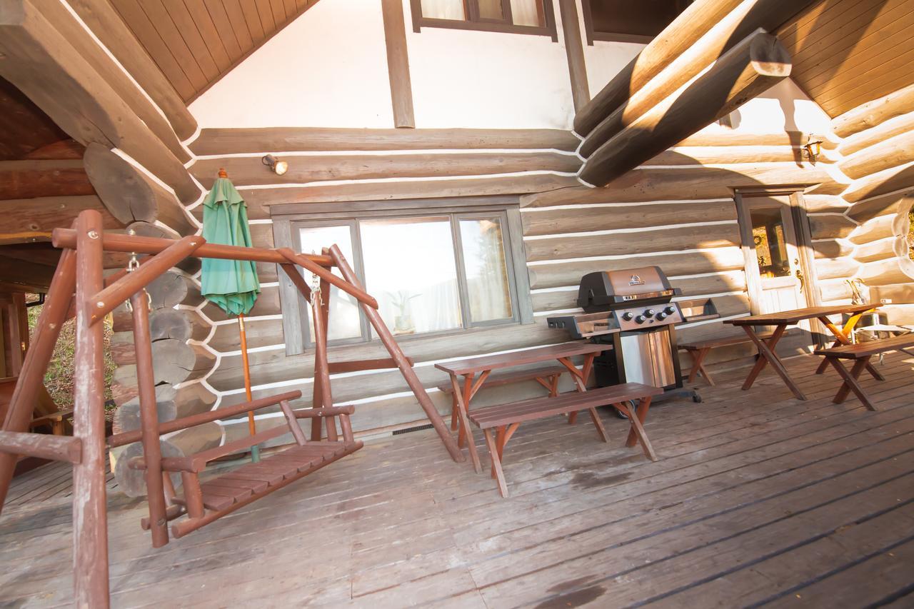 Отель Yufuin Log House No Yado Tom Sawyer Экстерьер фото