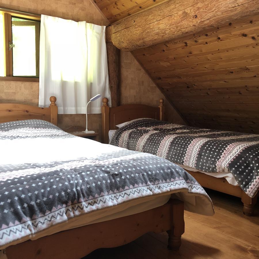 Отель Yufuin Log House No Yado Tom Sawyer Экстерьер фото
